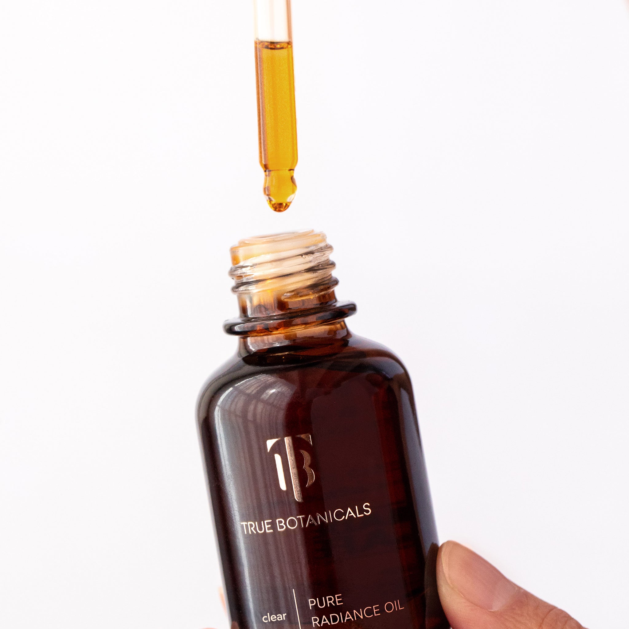 True Botanicals-CLEAR Pure Radiance Oil-Skincare-S-W-D-PRC1-R-2_adb43f07-46ab-4f37-8e68-8cc6c97eceff-The Detox Market | 